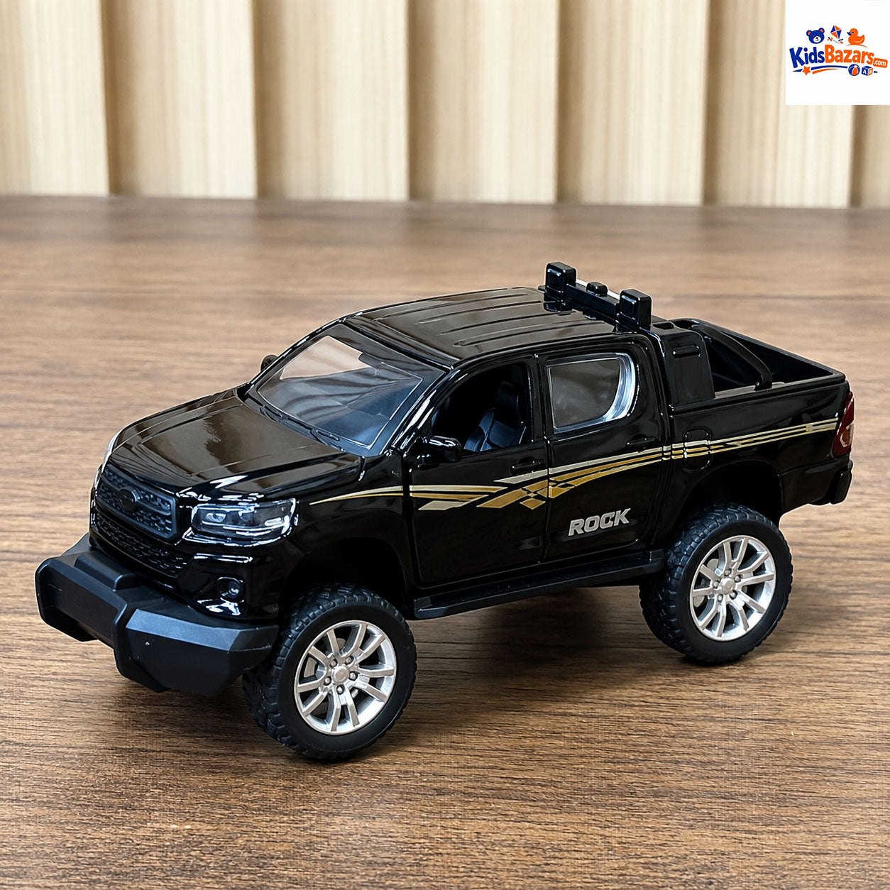 Die-cast Toyota Hilux Revo model car.