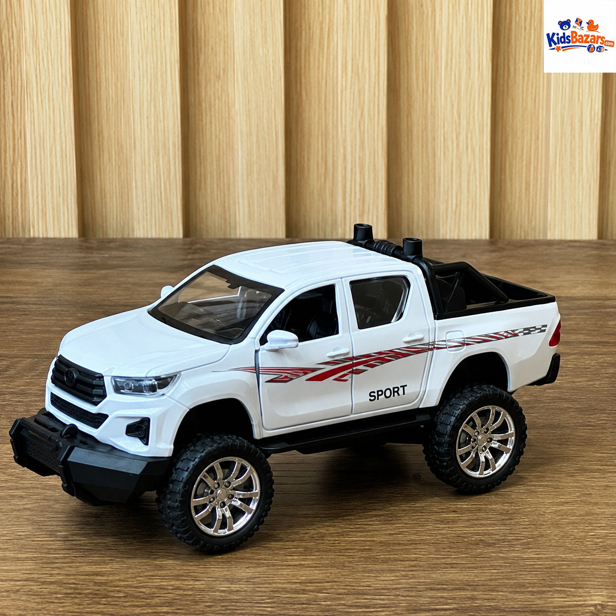 Die-cast Toyota Hilux Revo model car.