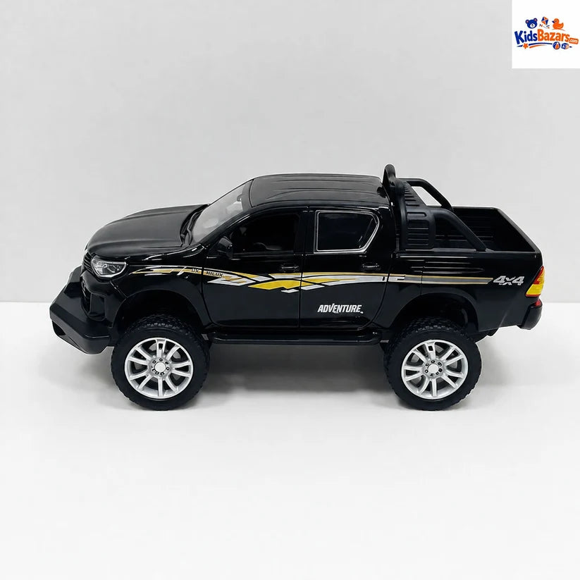 Die-cast Toyota Hilux Revo model car.